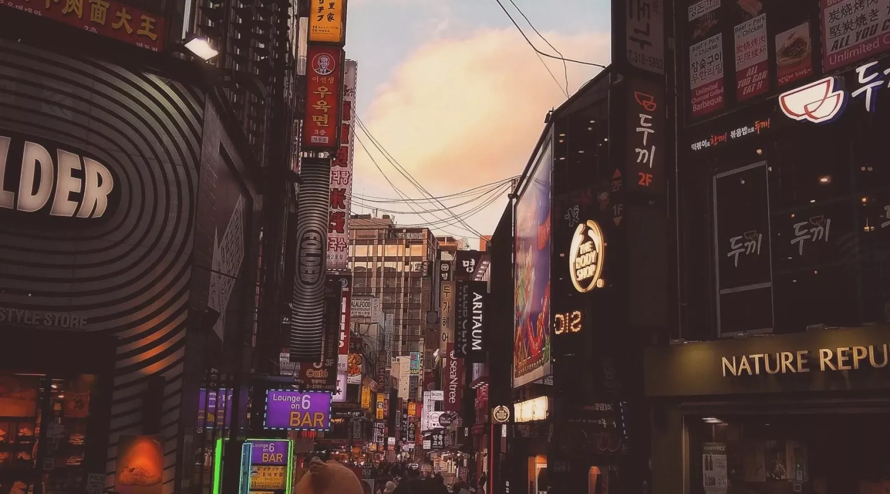 Shopping plaza with lights and signs in Korea