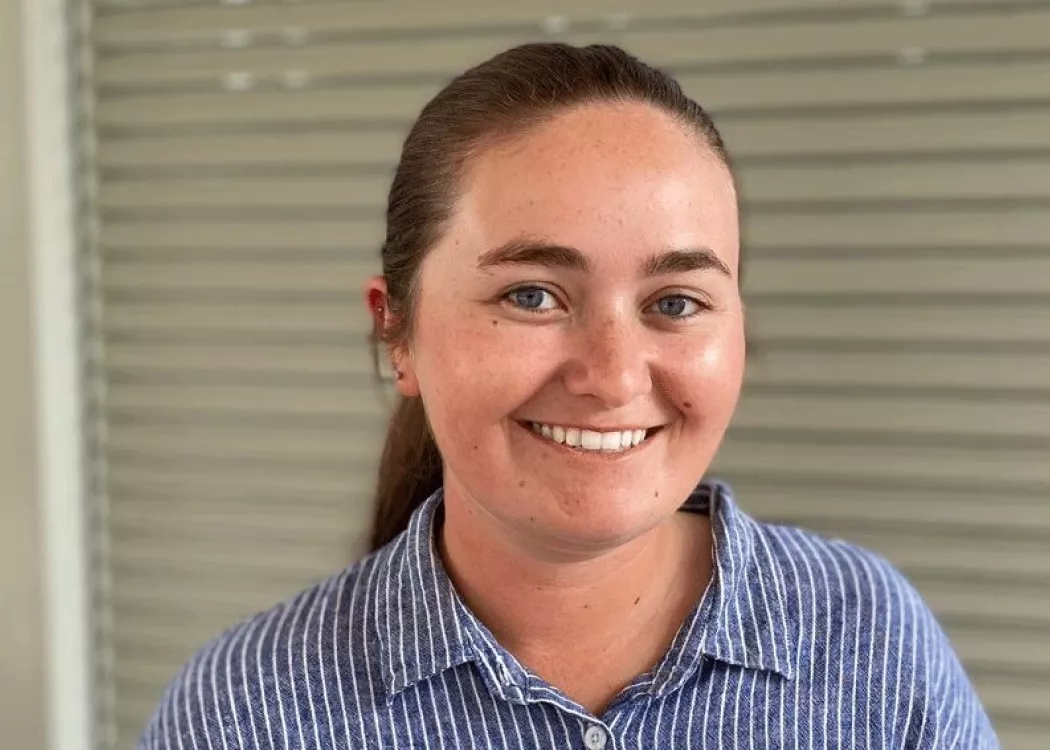 Headshot of a woman smiling.
