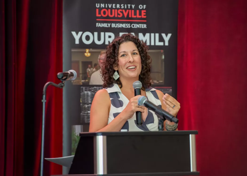 Keynote, Anne Bauer, speaking at podium